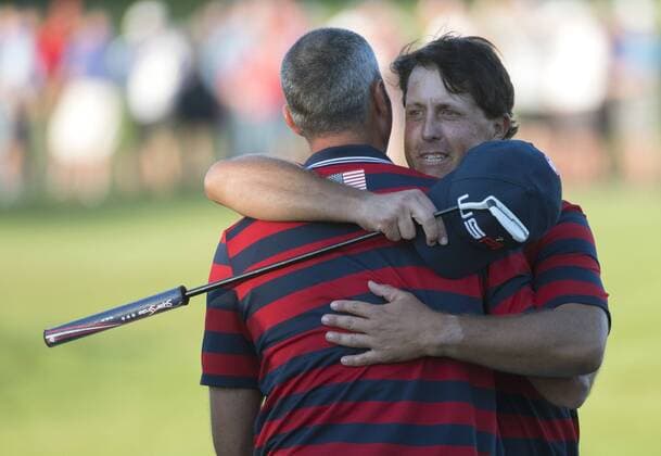 USA team members Phil Mickelson and Matt Kuchar celebrate after winning their round during during day 2 of the 2016 Ryder Cup at Hazeltine National Golf Club in Chaska, Minnesota on October 1, 2016.  MIN20161001347 KEVINxDIETSCH
