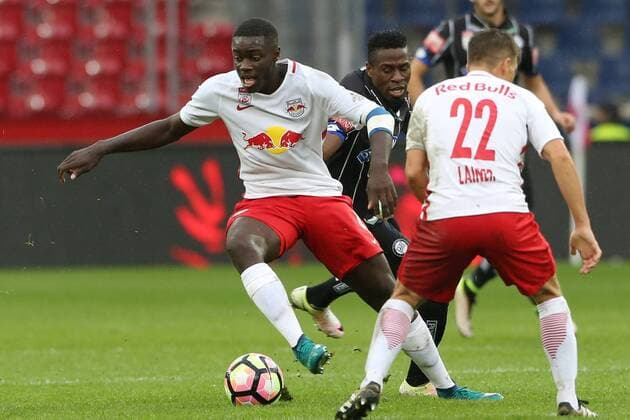 SOCCER - BL, RBS vs Sturm SALZBURG,AUSTRIA,02.OCT.16 - SOCCER - tipico Bundesliga, Red Bull Salzburg vs SK Sturm Graz. Image shows Dayot Upamecano (RBS) and Bright Osagie Edomwonyi (Sturm). GEPAxpictures xMathiasxMandl