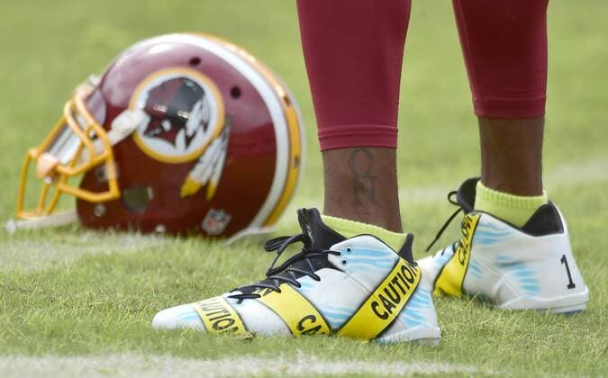 October 2, 2016 - Landover, Maryland, United States of America - Close-up of the shoes Washington Redskins wide receiver DeSean Jackson (11) is wearing during warm-ups prior to the game against the Cleveland Browns at FedEx Field in Landover, Maryland on October 2, 2016. Earlier in the day, the Redskins released the a statement about Jackson s shoes. Jackson is quoted as saying œToday is the start of my attempts to be part of a solution and start dialogue about the senseless killings of both citizens and police. I have chosen to wear these cleats in pregame today to use my platform as a pro athlete to add to this discussion. This isn™t meant to be any kind of protest against the good men and women in law enforcement in this country. I just want to express my concern in a peaceful and productive way about issues that are currently impacting our country. The team added œWe stand in support of both DeSean and the law enforcement community. We have great respect for law enforcement and the sacrifices they make each and every day to protect and serve our communities. We continue to have open dialogue with our players about issues that are important to them and support their efforts to bring awareness to those issues when done in a responsible manner..Credit: CNP Cleveland Browns v. Washington Redskins - ZUMAs152