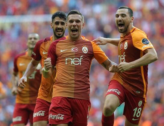 Turkey superleague match between Galatasaray and Antalyaspor at Turk Telekom Arena in Istanbul , Turkey , October 02 , 2016. Final Score : Galataaray 3 - Antalyaspor 1 Pictured : Tolga Cigerci (L) , Lukas Podolski (C) and Sinan Gumus of Galatasaray . 