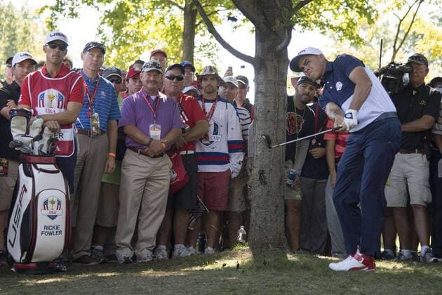 USA team member Rickie Fowler hits from the gallery on the 5th hole during day 3 of the 2016 Ryder Cup at Hazeltine National Golf Club in Chaska, Minnesota on October 2, 2016.  MIN20161002305 KEVINxDIETSCH