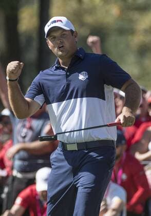 USA team member Patrick Reed celebrates after making a putt for birdie on the 5th hole during day 3 of the 2016 Ryder Cup at Hazeltine National Golf Club in Chaska, Minnesota on October 2, 2016.  MIN20161002309 KEVINxDIETSCH