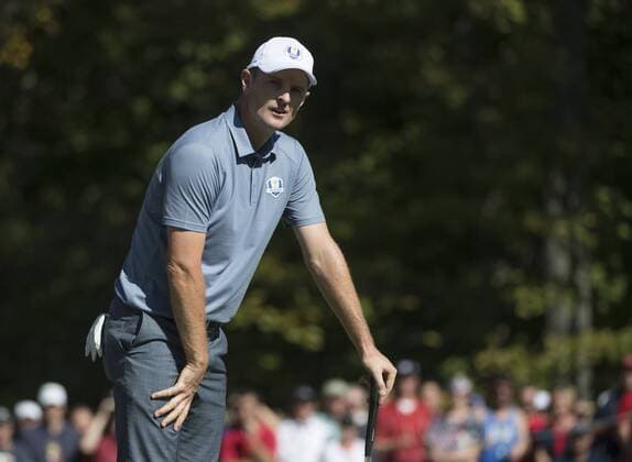 European team member Justin Rose reacts on the 5th green during day 3 of the 2016 Ryder Cup at Hazeltine National Golf Club in Chaska, Minnesota on October 2, 2016.  MIN20161002319 KEVINxDIETSCH