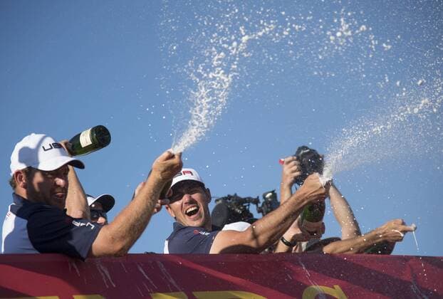 Members of team USA celebrate after winning the 2016 Ryder Cup at Hazeltine National Golf Club in Chaska, Minnesota on October 2, 2016. USA defeated Europe 17-11 to win the Ryder Cup for the first time since 2008.  MIN20161002332 KEVINxDIETSCH