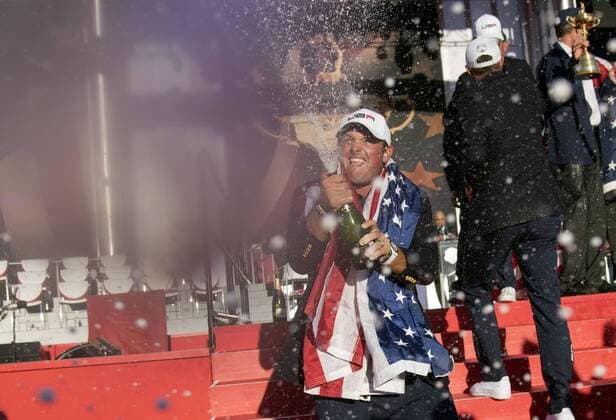 USA team member Patrick Reed celebrates after the United States defeated Europe 17-11 to win the 2016 Ryder Cup at Hazeltine National Golf Club in Chaska, Minnesota on October 2, 2016. USA defeated Europe for the first time since 2008.  MIN20161002351 KEVINxDIETSCH