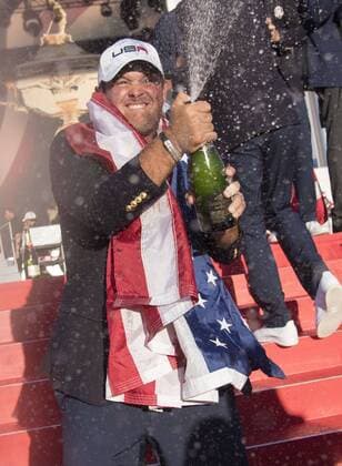 USA team member Patrick Reed celebrates after the United States defeated Europe 17-11 to win the 2016 Ryder Cup at Hazeltine National Golf Club in Chaska, Minnesota on October 2, 2016. USA defeated Europe for the first time since 2008.  MIN20161002352 KEVINxDIETSCH