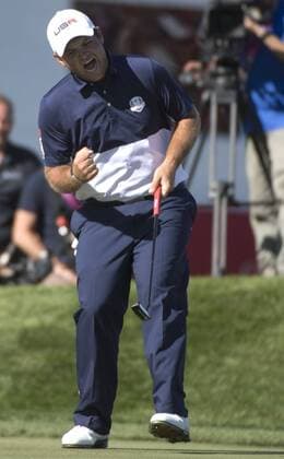 USA team member Patrick Reed celebrates after winning his match during the final round of the 2016 Ryder Cup at Hazeltine National Golf Club in Chaska, Minnesota on October 2, 2016. USA defeated Europe 17-11 winning the Ryder Cup for the first time since 2008.  MIN20161002363 KEVINxDIETSCH