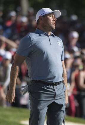 European team member Lee Westwood reacts after missing a putt on the 16th green during the final round of the 2016 Ryder Cup at Hazeltine National Golf Club in Chaska, Minnesota on October 2, 2016. USA defeated Europe 17-11 winning the Ryder Cup for the first time since 2008.  MIN20161002375 KEVINxDIETSCH