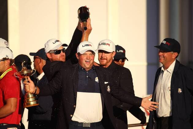 GOLF - Ryder Cup 2016 CHASKA,MINNESOTA,USA,02.OKT.16 - GOLF - Ryder Cup, Hazeltine National Golf Club, award ceremony. Image shows J.B. Holmes, Patrick Reed, Jimmy Walker and captain Davis Love III (USA). Keywords: trophy. GEPAxpictures xDanielxGoetzhaber