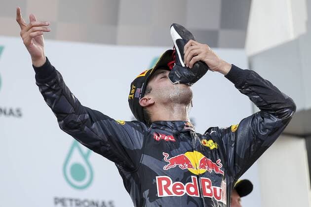 02 October 2016: Daniel Ricciardo of Red Bull Racing celebrate on the podium after winning the race of the Formula 1 Petronas Malaysia Grand Prix held at Sepang International Circuit in Sepang, Malaysia.(Photo by Hazrin Yeob Men Shah Icon Sportswire) AUTO: OCT 02 Formula 1 - Malaysia Grand Prix Icon3781610028080 EDITORIAL USE ONLY