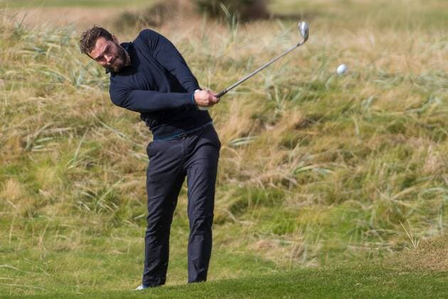 06.10.2016. Carnoustie Golf Course, Fife, Scotland. Alfred Dunhill Links Championship Golf 1st Round. Irish actor Jamie Doran hits an approach shot xDuncanxMcGlynnx  ActionPlus11797137