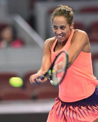 (161007) -- BEIJING, Oct. 7, 2016 -- Madison Keys of the United States hits a return to Petra Kvitova of the Czech Republic during their women s singles quarterfinal match at the China Open tennis tournament in Beijing, capital of China, Oct. 7, 2016. Madison Keys won by 2-1. ) (SP)CHINA-BEIJING-TENNIS-CHINA OPEN (CN) LixWen 