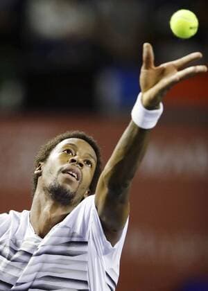 Tennis: Monfils moves into semifinals in Tokyo Gael Monfils of France serves on his way to defeating Ivo Karlovic of Croatia 7-6(6), 7-6(6) in the quarterfinals of the Japan Open at Ariake Tennis Forest Park in Tokyo on Oct. 7, 2016. 