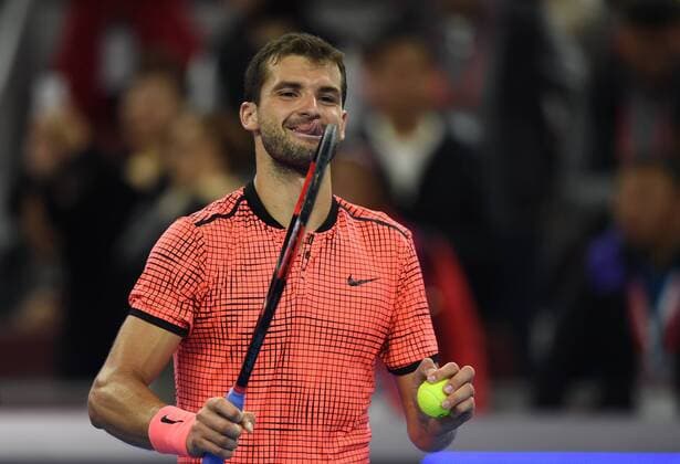 (161007) -- BEIJING, Oct. 7, 2016 -- Grigor Dimitrov of Bulgaria reacts after winning his men s singles quarterfinal match against Rafael Nadal of Spain at the China Open tennis tournament in Beijing, capital of China, Oct. 7, 2016. Grigor Dimitrov won by 2-0. ) (SP)CHINA-BEIJING-TENNIS-CHINA OPEN (CN) JuxHuanzong 