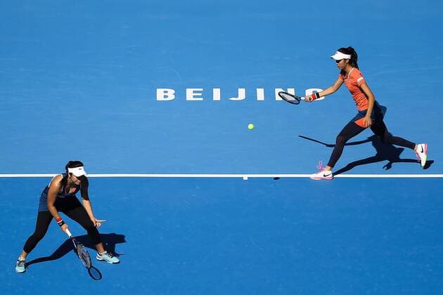 BEIJING, CHINA - OCTOBER 08: Hao-Ching Chan and Yung-Jan Chan of Chinese Taipei in action during the Women s doubles semifinals against Caroline Garcia and Kristina Mladenovic of France on day eight of the 2016 China Open at the China National Tennis Centre on October 8, 2016 in Beijing, China.  CFP493487116 
