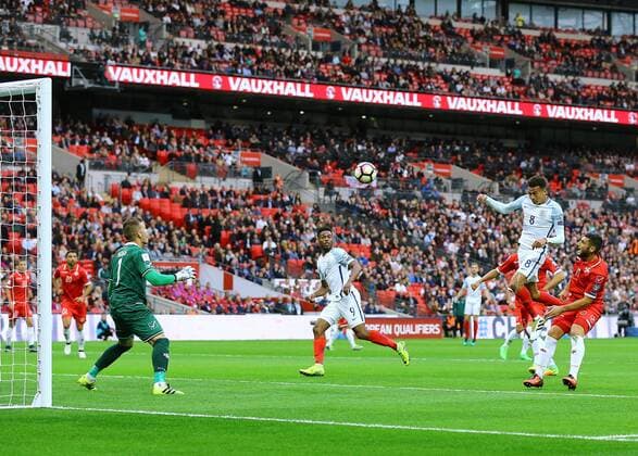 FuÃŸball, WM Quali, England - Malta 08.10.2016. Wembley Stadium, London, England. FIFA World Cup WM Weltmeisterschaft Fussball Qualifying Football. England versus Malta. England Midfielder Dele Alli s header is saved by Malta Goalkeeper Andrew Hogg xMarkxKertonx  ActionPlus11798052