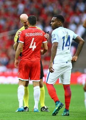 08.10.2016. Wembley Stadium, London, England. FIFA World Cup WM Weltmeisterschaft Fussball Qualifying Football. England versus Malta. Referee Stefan Johannesson has a word with Malta Midfielder Gareth Sciberras after he fouls England Defender Danny Rose xMarkxKertonx  ActionPlus11798057