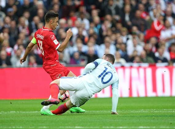 England s Wayne Rooney fouls Malta s Andre Schembri but is not booked during the World Cup Qualifying Group F match at Wembley Stadium, London. Picture date October 8th, 2016 Pic David Klein Sportimage EDITORIAL USE ONLY. No use with unauthorised audio, video, data, fixture lists, club league logos or live services. Online in-match use limited to 120 images, no video emulation. No use in betting, games or single club league player publications.