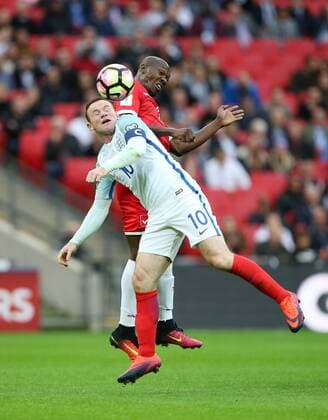England s Wayne Rooney tussles with Malta s Alfred Effiong during the World Cup Qualifying Group F match at Wembley Stadium, London. Picture date October 8th, 2016 Pic David Klein Sportimage EDITORIAL USE ONLY. No use with unauthorised audio, video, data, fixture lists, club league logos or live services. Online in-match use limited to 120 images, no video emulation. No use in betting, games or single club league player publications.