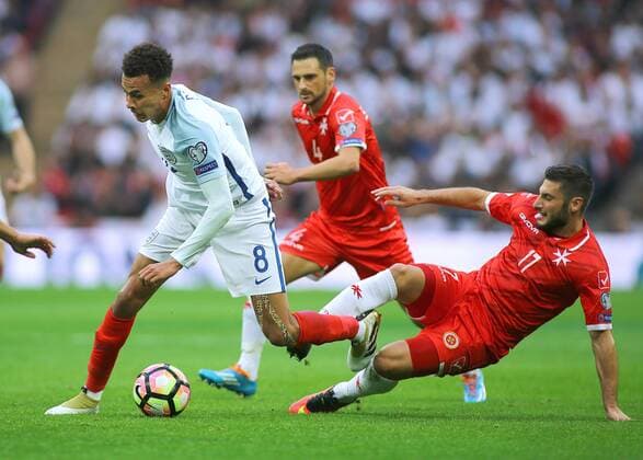 08.10.2016. Wembley Stadium, London, England. FIFA World Cup WM Weltmeisterschaft Fussball Qualifying Football. England versus Malta. England Midfielder Dele Alli takes the ball past Malta Defender Ryan Camilleri xMarkxKertonx  ActionPlus11798065