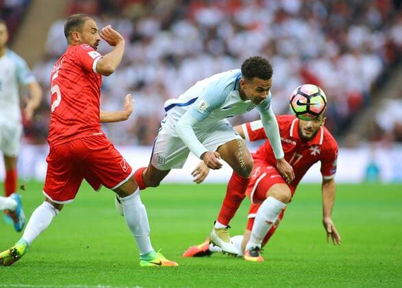 08.10.2016. Wembley Stadium, London, England. FIFA World Cup WM Weltmeisterschaft Fussball Qualifying Football. England versus Malta. England Midfielder Dele Alli is fouled by Malta Defender Andrei Agius xMarkxKertonx  ActionPlus11798066