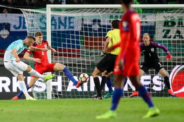 SOCCER - FIFA World Cup WM Weltmeisterschaft Fussball 2018 quali, SLO vs ENG LJUBLJANA,SLOVENIA,11.OCT.16 - SOCCER - FIFA World Cup 2018, european qualifiers, international match Länderspiel Slovenia vs England. Image shows Josip Ilicic (SLO) and John Stones (ENG). GEPAxpictures xMaticxKlansek