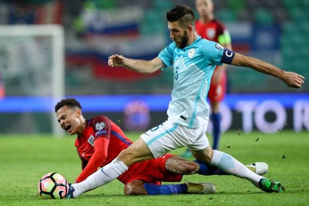 SOCCER - FIFA World Cup WM Weltmeisterschaft Fussball 2018 quali, SLO vs ENG LJUBLJANA,SLOVENIA,11.OCT.16 - SOCCER - FIFA World Cup 2018, european qualifiers, international match Länderspiel Slovenia vs England. Image shows Dele Alli (ENG) and Bostjan Cesar (SLO). GEPAxpictures xMaticxKlansek