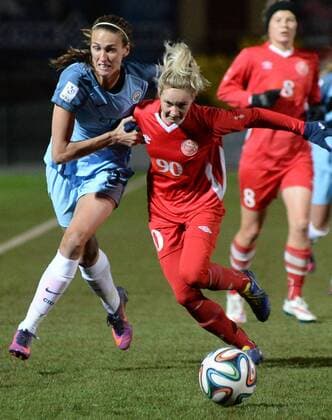 PERM, RUSSIA â€“ OCTOBER 12, 2016: Manchester City s Jill Scott (L) and Zvezda 2005 Perm s Anastasia Akimova fight for the ball in the second leg of their 2016 17 Season UEFA Women s Champions League Round of 32 football match at Zvezda Stadium. FC Manchester City won the game 4-0. Donat Sorokin TASS  TS034507