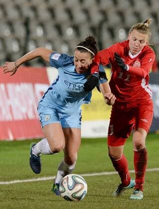 PERM, RUSSIA â€“ OCTOBER 12, 2016: Manchester City s Jill Scott (L) and Zvezda 2005 Perm s Yekaterina Pantyukhina fight for the ball in the second leg of their 2016 17 Season UEFA Women s Champions League Round of 32 football match at Zvezda Stadium. FC Manchester City won the game 4-0. Donat Sorokin TASS  TS034518