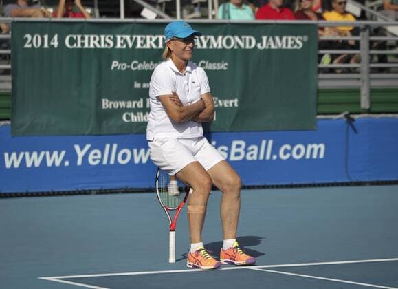 Nov. 23, 2014 - Florida, U.S. - Martina Navratilova sits on her racket as she waits for play to resume during the final match of the day at the Chris Evert Raymond James 2014 Pro-Celebrity Tennis Classic in Delray Beach Sunday, November 23, 2014. Navratilova was paired with Gavin Rossdale against Jon Lovitz and Chris Evert. - ZUMAp77 Nov 23 2014 Florida U S Martina Navratilova sits ON her racket As She Waits for Play to Resume during The Final Match of The Day AT The Chris Evert Raymond James 2014 pro Celebrity Tennis Classic in Delray Beach Sunday November 23 2014 Navratilova what paired With Gavin Dale Ross against Jon Lovitz and Chris Evert ZUMAp77 Nov 23 2014 Florida U S Martina Navratilova sits on her racket as she waits for play to resu - ZUMA1