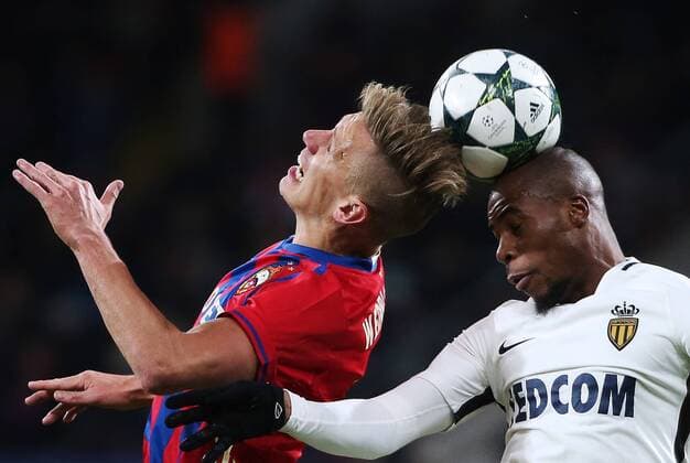 MOSCOW, RUSSIA - OCTOBER 18, 2016: CSKA Moscow s Pontus Wernbloom (L) and Monaco s Djibril Sidibe jump to head the ball in their 2016 17 Season UEFA Champions League Group E Round 3 football match at the Arena CSKA Stadium. Valery Sharifulin TASS  TS034DB2