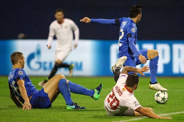 SOCCER - CL, Zagreb vs Sevilla ZAGREB,CROATIA,18.OCT.16 - SOCCER - UEFA Champions League, group stage, GNK Dinamo Zagreb vs Sevilla FC. Image shows Filip Benkovic (Zagreb), Vitolo (Sevilla) and Leonardo Sigali (Zagreb). GEPAxpictures xMaticxKlansek