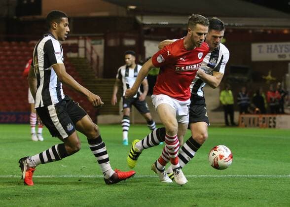 18.10.2016. Oakwell, Barnsley, England. Skybet Championship Football. Barnsley versus Newcastle. Barnsley s Marley Watkins runs for the ball as Clark pulls him back xKurtxFairhurstx  ActionPlus11801277