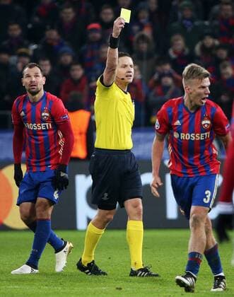 MOSCOW, RUSSIA - OCTOBER 18, 2016: Referee Martin Strombergsson (C) shows a yellow cardthe 2016 17 Season UEFA Champions League Group E Round 3 football match between CSKA Moscow and AS Monaco at the Arena CSKA Stadium. Valery Sharifulin TASS  TS034DD6