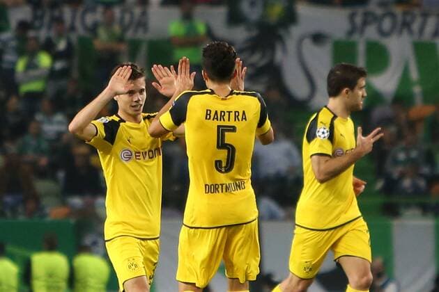 October 18, 2016 - Lisbon, Portugal - Dortmund s midfielder Julian Weigl (L) celebrates with Dortmund s defender Marc Bartra after scoring a goal during the UEFA Champions League Group F football match Sporting CP vs Borussia Dortmund at the Alvalade stadium in Lisbon, Portugal on October 18, 2016. Photo: Sporting Clube de Portugal v Borussia Dortmund - UEFA Champions League  - ZUMAn230 20161018_zaa_n230_137
