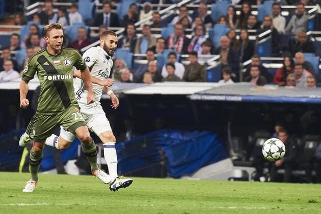 October 18, 2016 - Madrid, Spain - Karim Benzema (forward; Real Madrid), Jakub RzeÃÖÂºniczak (defender; Legia Warszawa) in action during the UEFA Champions League match between Real Madrid and Legia Warszawa at Santiago Bernabeu on October 18, 2016 in Madrid Real Madrid vs Legia Warszawa UEFA Champions League.  - ZUMAg15_ 20161018_zaf_g15_051