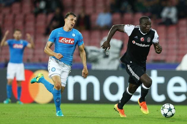 October 19, 2016 - Naples, Italy - Champions League Group B: Napoli vs Besiktas.Vlad Chiriches (N) and Vincent Aboubakar (B) at San Paolo Stadium in Naples, Italy on October 19, 2016. SSC Napoli v Besiktas JK - UEFA Champions League  - ZUMAn230 20161019_zaa_n230_151