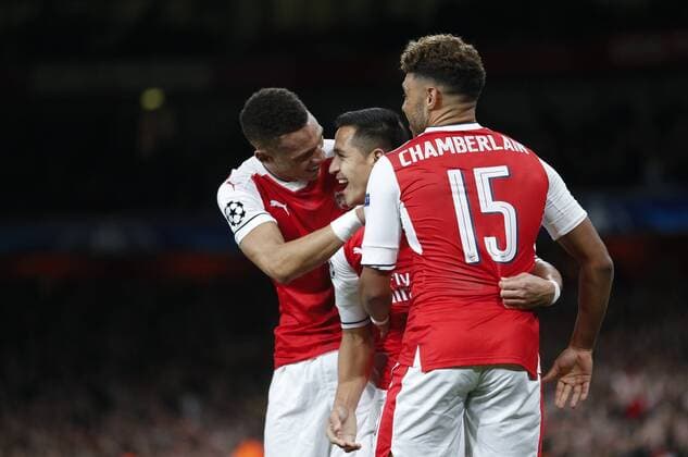 (161020) -- LONDON, Oct. 20, 2016 -- Alexis Sanchez of Arsenal (C) celebrates with teammates after scoring during the UEFA Champions League Group A match between Arsenal and Ludogorets Razgrad at the Emirates Stadium in London, Britain on Oct. 19, 2016. Arsenal won 6-0. ) (SP)BRITAIN-LONDON-FOOTBALL-UEFA CHAMPIONS LEAGUE-ARSENAL VS LUDOGORETS RAZGRAD HanxYan 