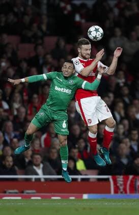 (161020) -- LONDON, Oct. 20, 2016 -- Shkodran Mustafi (R) of Arsenal heads for the ball during the UEFA Champions League Group A football match between Arsenal and Ludogorets Razgrad at the Emirates Stadium in London, Britain, on Oct. 19, 2016. Arsenal won 6-0. ) (SP)BRITAIN-LONDON-FOOTBALL-UEFA CHAMPIONS LEAGUE-ARSENAL VS LUDOGORETS RAZGRAD HanxYan 