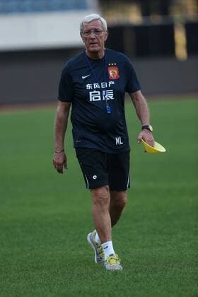 --FILE--Head coach Marcello Lippi of China s Guangzhou Evergrande takes part in a training session for their 20th round match during the 2014 Chinese Football Association Super League in Dalian city, northeast China s Liaoning province, 12 August 2014. Former World Cup-winning coach Marcello Lippi is being tipped to take over as coach of China to replace Gao Hongbo, reports said Wednesday (19 October 2016). Lippi, coach of China, ran the headline on the front page of Italy s second most popular sports daily Corriere dello It claimed the Italian maestro was inclined to accept the offer and added: In the coming days, the former Italy coach will travel to Beijing to pore over the details of the Chinese football association s offer. Report claims Lippi to coach China national team Nationalteam  20140812_11618