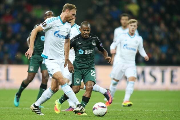 KRASNODAR, RUSSIA - OCTOBER 20, 2016: FC Schalke 04 s Benedikt Hoewedes and FC Krasnodar s Joaozinho (L-R front) fight for the ball in their 2016 17 Season UEFA Europa League Group I Round 3 football match at Krasnodar Stadium. Vitaly Timkiv TASS  TS0350C7