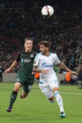 KRASNODAR, RUSSIA - OCTOBER 20, 2016: FC Krasnodar s Sergei Petrov (L) and FC Schalke 04 s Junior Caicara fight for the ball in their 2016 17 Season UEFA Europa League Group I Round 3 football match at Krasnodar Stadium. Vitaly Timkiv TASS  TS0350D3