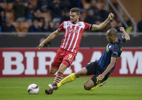Italy: FC Internazionale v Southampton FC - UEL Jay Rodriguez (left) and Joao Miranda compete for the ball during the Uefa Europa League football match between FC Internazionale and Southampton FC. FC Internazionale wins 1-0 over Southampton FC.  NicoloxCampox xPacificxPress