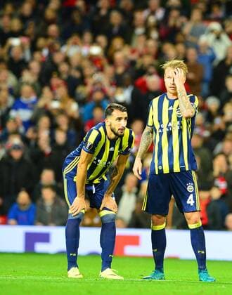 UEFA Europa League Group A day 3 match between Manchester United ManU and Fenerbahce at Old Trafford Stadium in Manchester , England , October 20 , 2016. Final Score: Manchester United 4 - Fenerbhace 1 Pictured: Simon Kjaer and Mehmet Topal of Fenerbahce. 