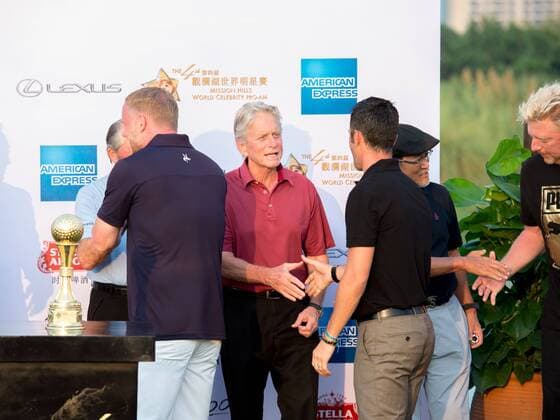 October 23, 2016 - Haikou, Hainan, China - Michael Douglas (M) congratulates footballer Luis Javier Garcia Sanz.Prize presentation ceremony at the Blackstone course in Mission Hills resort Haikou during the 2nd round of the 4th World celebrity Pro-am. .Blackstone course, Mission Hills resort, Haikou, Hainan Island China. Round 2 of the Mission Hills 4th World celebrity Pro-Am tournament 2016 - ZUMAr144 20161023_zap_r144_013