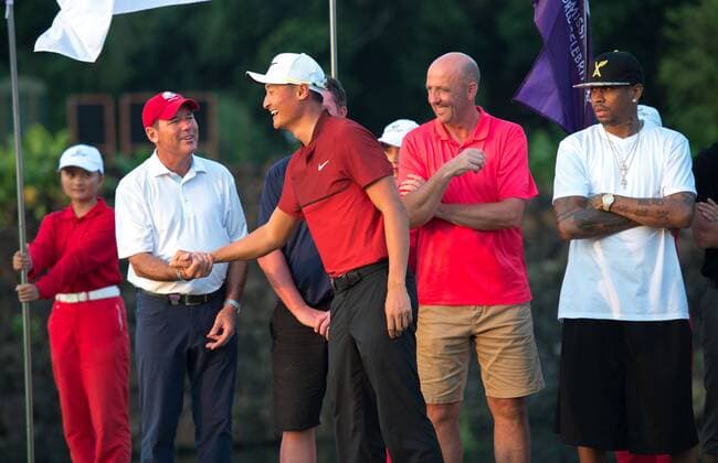 October 23, 2016 - Haikou, Hainan, China - L to R Golfer Rich Beem shakes the hand of Li Haotong, footballer Gary McAllister, Basketballer Allen Iverson, Prize presentation ceremony at the Blackstone course in Mission Hills resort Haikou during the 2nd round of the 4th World celebrity Pro-am. .Blackstone course, Mission Hills resort, Haikou, Hainan Island China. Round 2 of the Mission Hills 4th World celebrity Pro-Am tournament 2016 - ZUMAr144 20161023_zap_r144_022