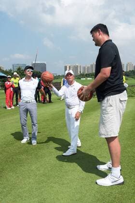 October 23, 2016 - Haikou, Hainan, China - Golfer Gary Player joins basketballer Yao Ming (R) for a basketball shoot out on the 17th tee at the Blackstone course in Mission Hills resort Haikou during the 2nd round of the 4th World celebrity Pro-am. .Blackstone course, Mission Hills resort, Haikou, Hainan Island China. Round 2 of the Mission Hills 4th World celebrity Pro-Am tournament 2016 - ZUMAr144 20161023_zap_r144_031