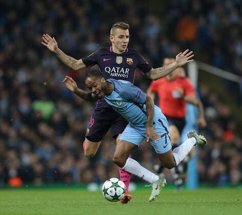 Raheem Sterling of Manchester City brought down by Lucas Digne of Barcelona during the Champions League Group C match at the Etihad Stadium, Manchester. Picture date: November 1st, 2016. Pic Simon Bellis Sportimage EDITORIAL USE ONLY. No use with unauthorised audio, video, data, fixture lists, club league logos or live services. Online in-match use limited to 120 images, no video emulation. No use in betting, games or single club league player publications.