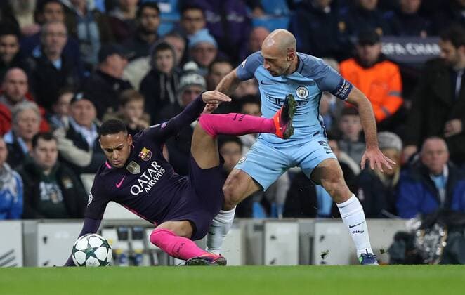 Football - 2016 2017 UEFA Champions League - Group C: Manchester City vs. Barcelona Neymar of Barcelona is fouled by Pablo Zabaleta of Manchester City during the match at The Etihad Stadium. COLORSPORT LYNNE CAMERON 