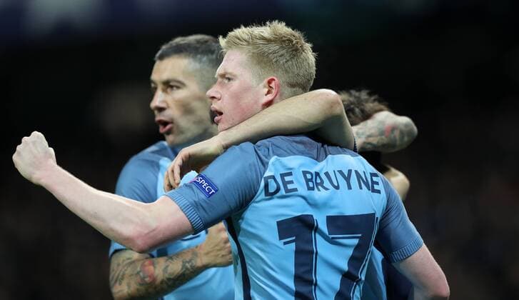 Football - 2016 2017 UEFA Champions League - Group C: Manchester City vs. Barcelona Kevin De Bruyne of Manchester City congratulates team mate Ilkay Gundogan of Manchester City after scoring his first goal during the match at The Etihad Stadium. COLORSPORT LYNNE CAMERON 